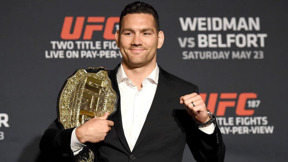 052115-UFC-Chris-Weidman-poses-with-the-belt-during-the-UFC-187-PI.vadapt.955.high.0